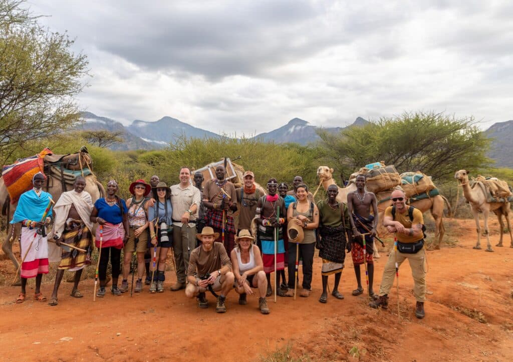 Participants, Samburu crew and the pack camels together on the trail in northern Kenya